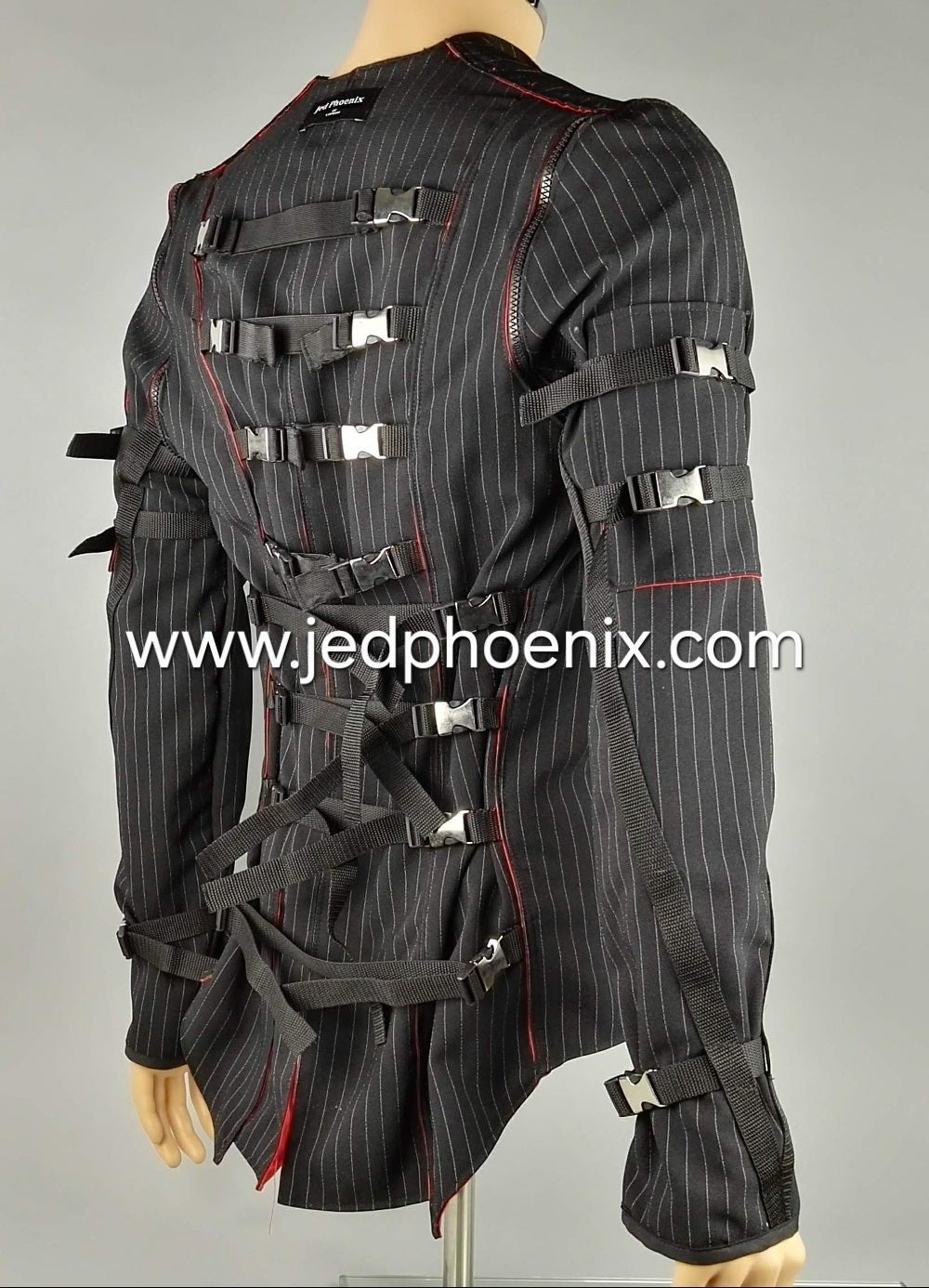 Back view of pinstripe bondage jacket, showing a series of webbing straps that can be used to adjust the fit of this garment